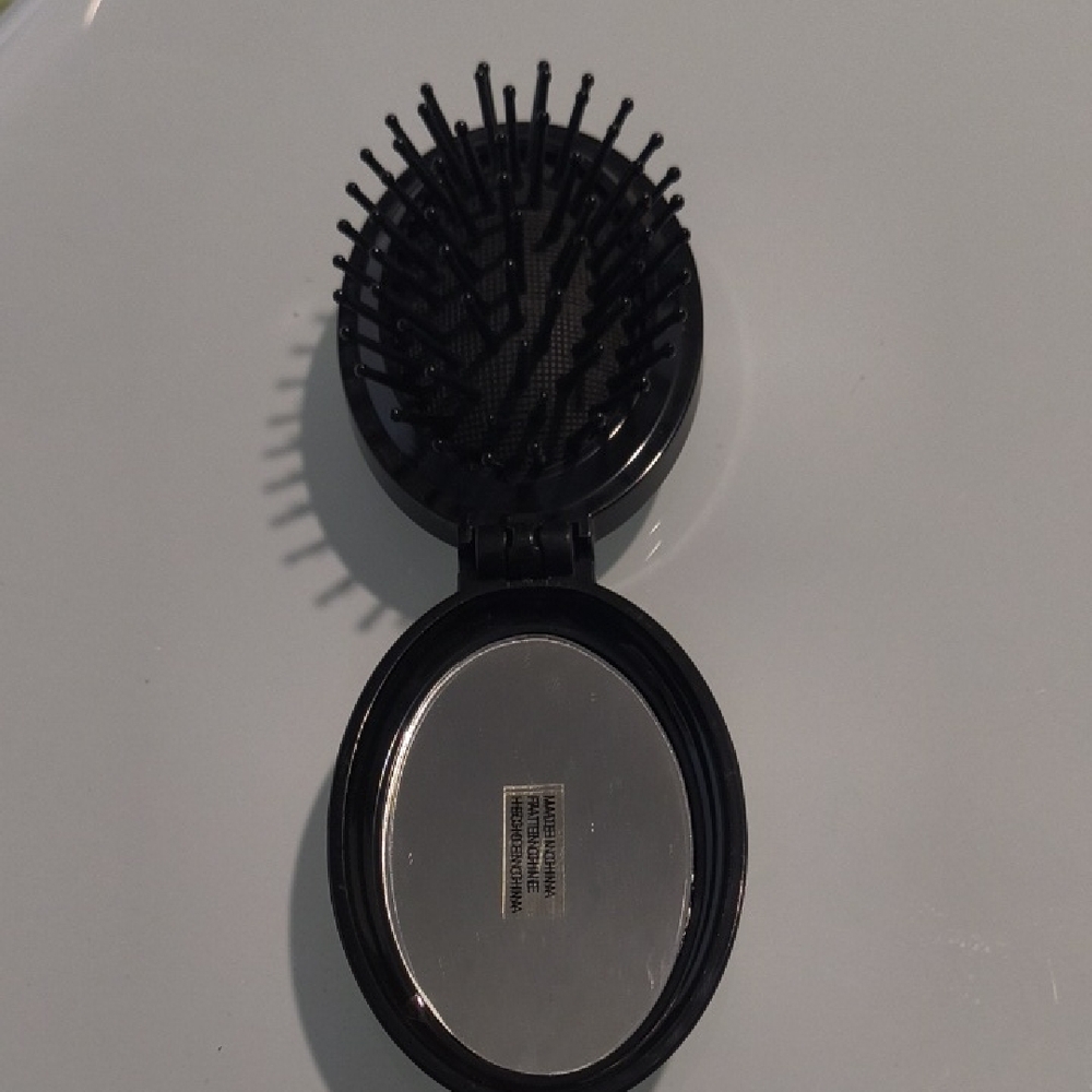 Compact Black Hairbrush with Mirror